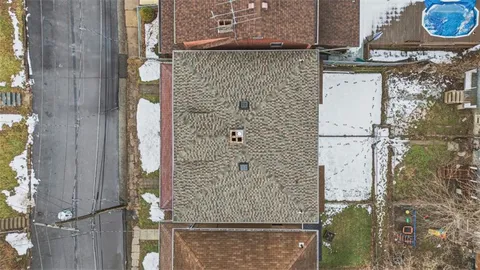 an aerial view of a house with entryway