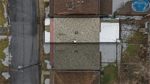 an aerial view of a house with balcony