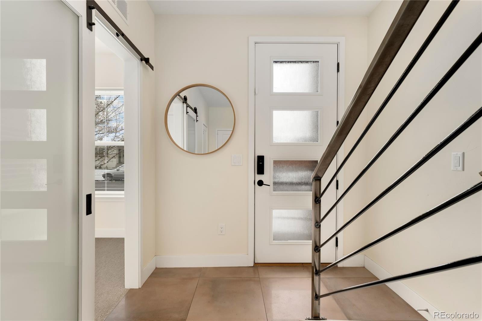 1587 Perry Street Denver, CO 80204 - Photo 25 of 37 a view of a hallway with wooden floor and entryway