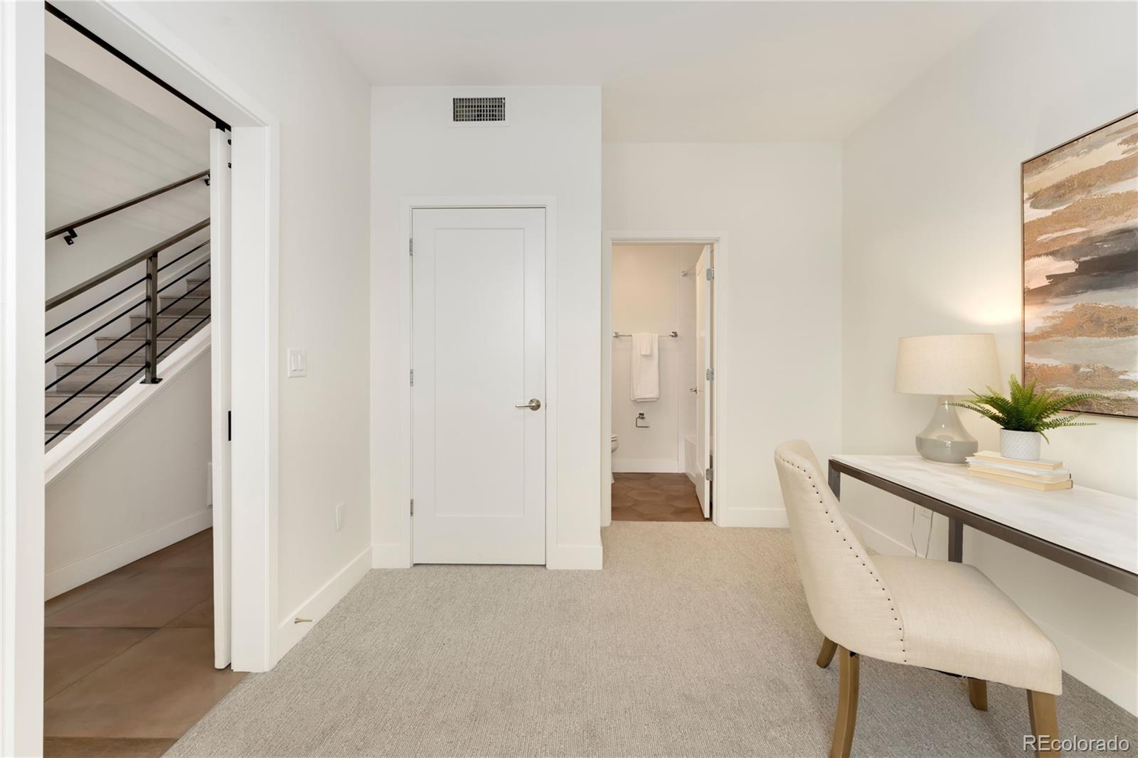 1587 Perry Street Denver, CO 80204 - Photo 28 of 37 a room with a table and chairs