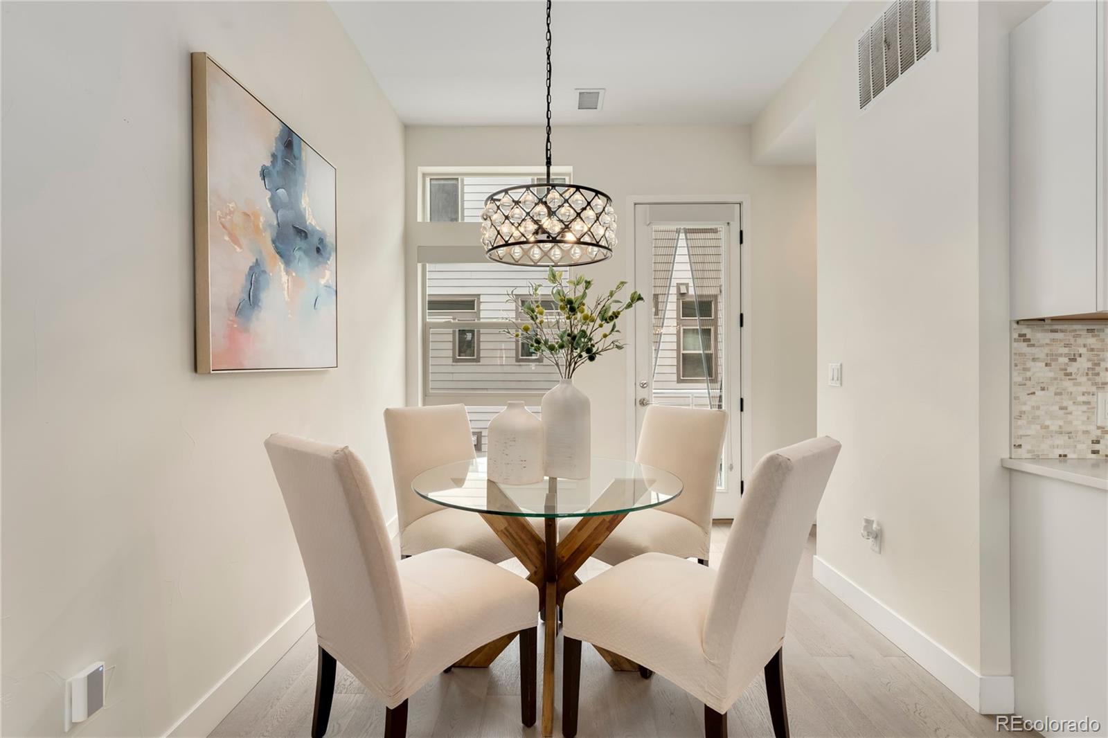 1587 Perry Street Denver, CO 80204 - Photo 4 of 37 a dining room with furniture and window