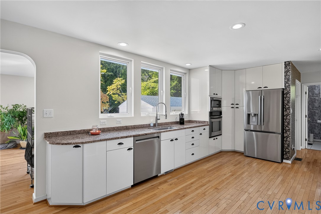 17089 Goshen Road Montpelier, VA 23192 - Photo 11 of 64 Contemporary kitchen featuring white cabinetry wit