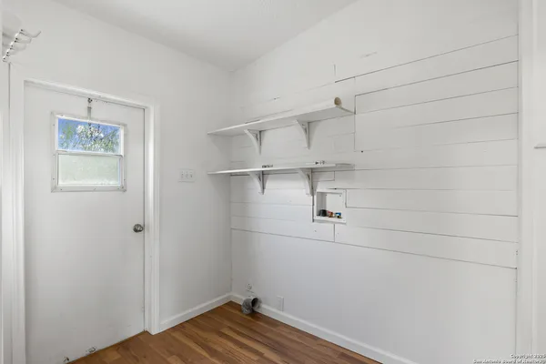 a view of small space with racks on the wall