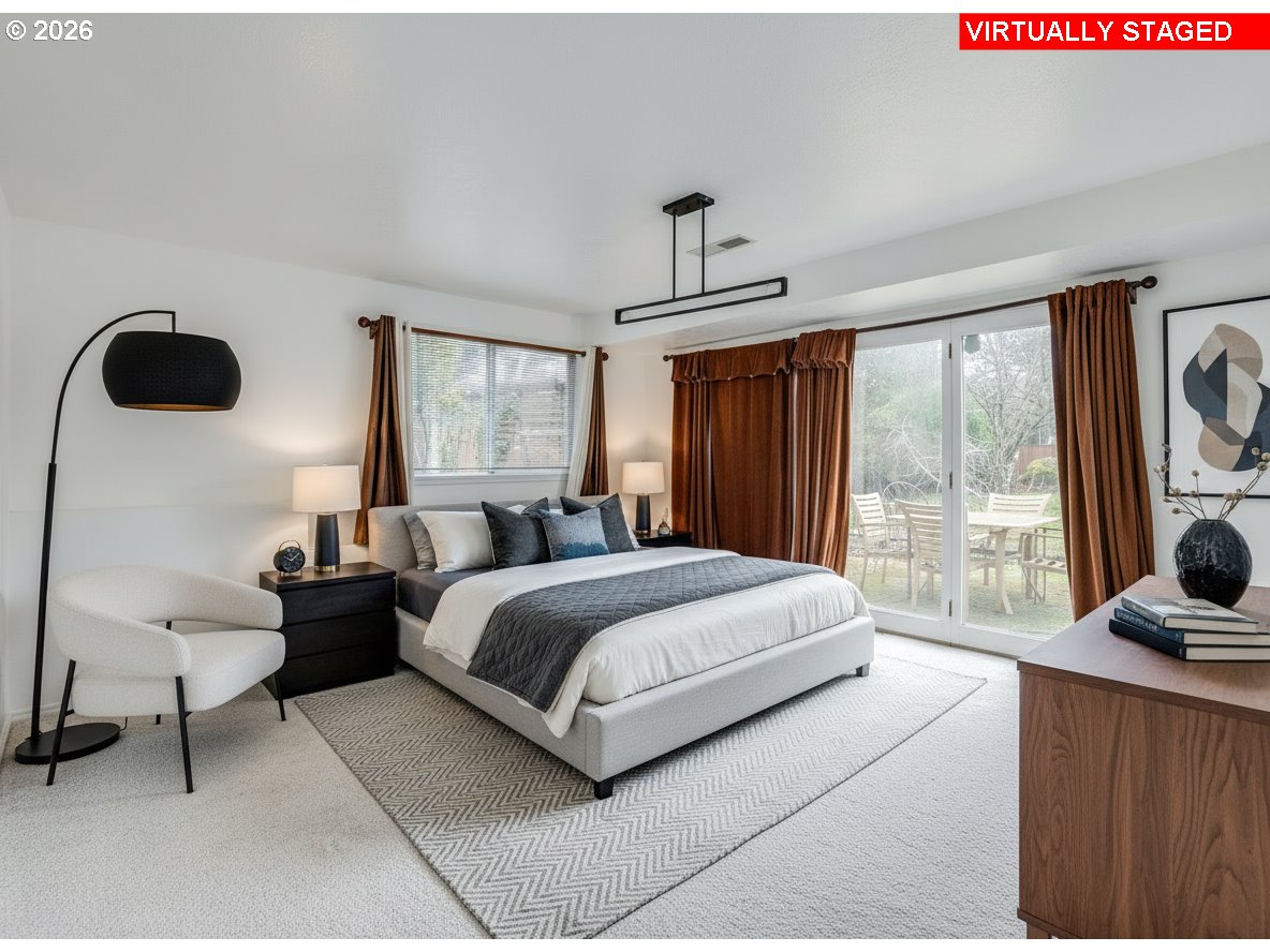 204 Crestwood Street Fairview, OR 97024 - Photo 15 of 29 a spacious bedroom with a bed and a large window