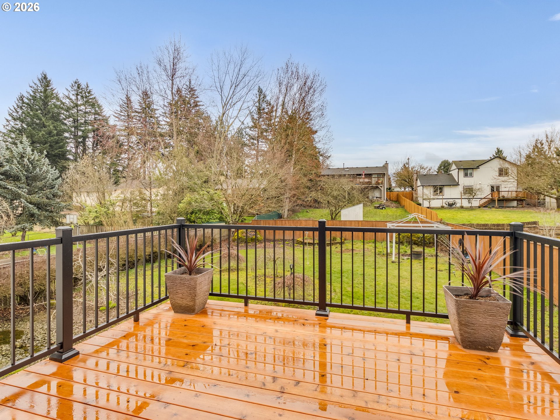 204 Crestwood Street Fairview, OR 97024 - Photo 26 of 29 a view of a balcony with wooden floor