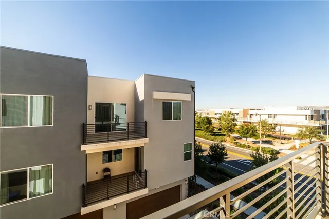 a view of a balcony with city view