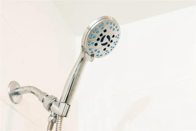 a view of a swimming pool with lounge chairs