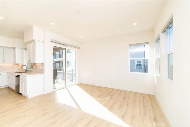 a view of a kitchen and a sink