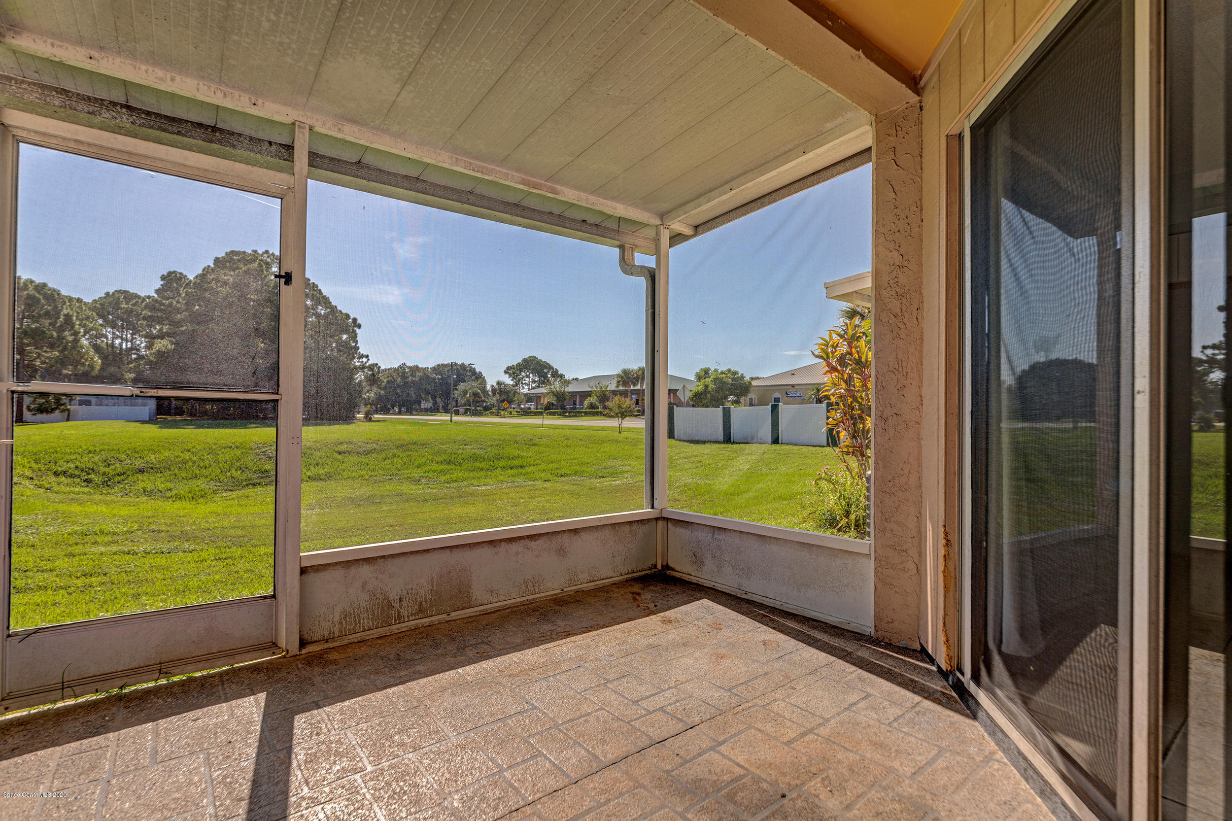 1880 Murrell Road, Unit 66 Rockledge, FL 32955 - Photo 19 of 22 Screened Patio