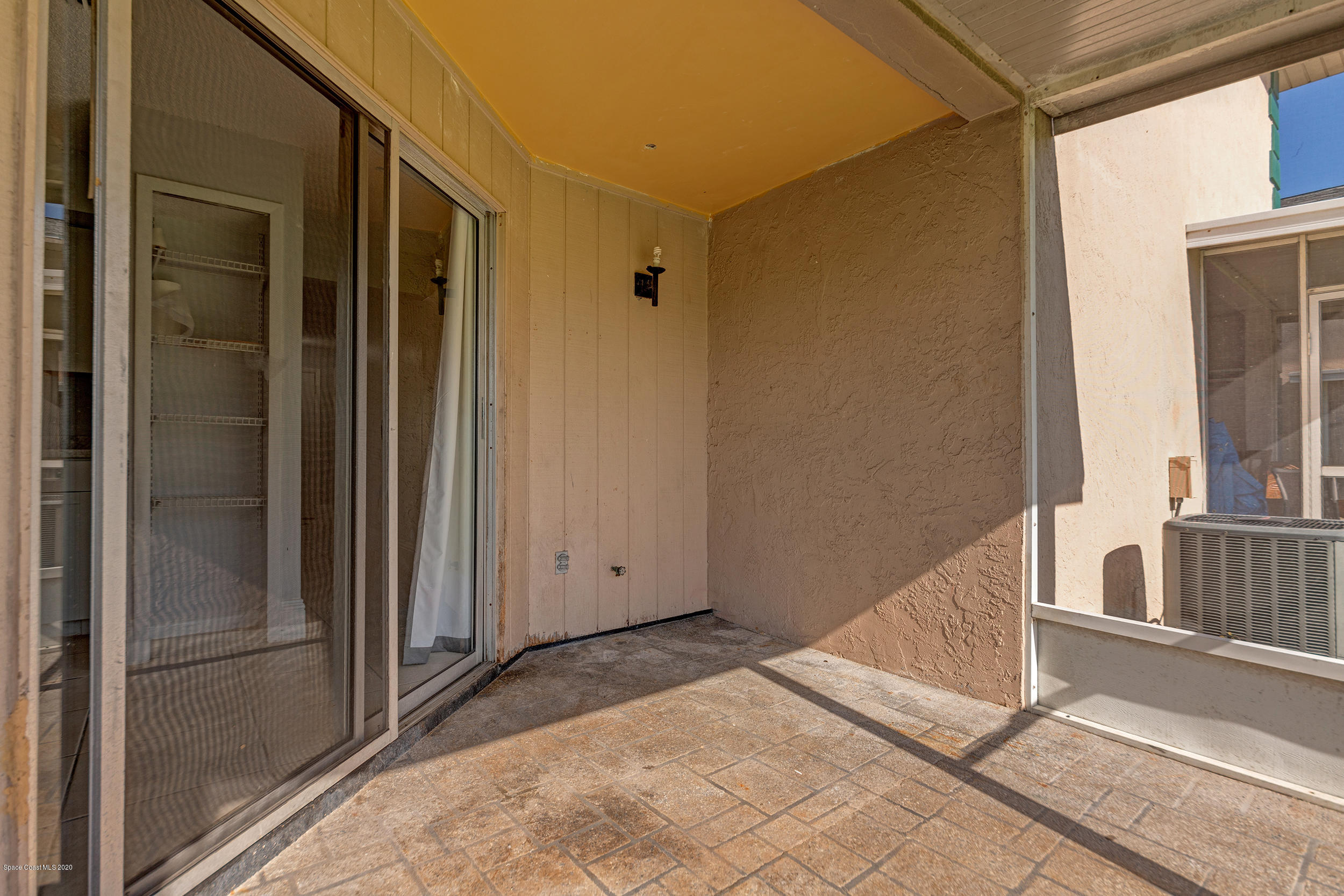 1880 Murrell Road, Unit 66 Rockledge, FL 32955 - Photo 20 of 22 Screened Patio