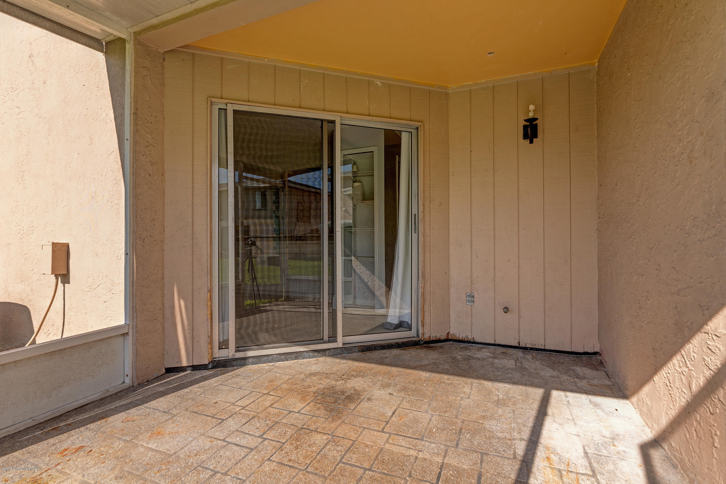 1880 Murrell Road, Unit 66 Rockledge, FL 32955 - Photo 21 of 22 Screened Patio