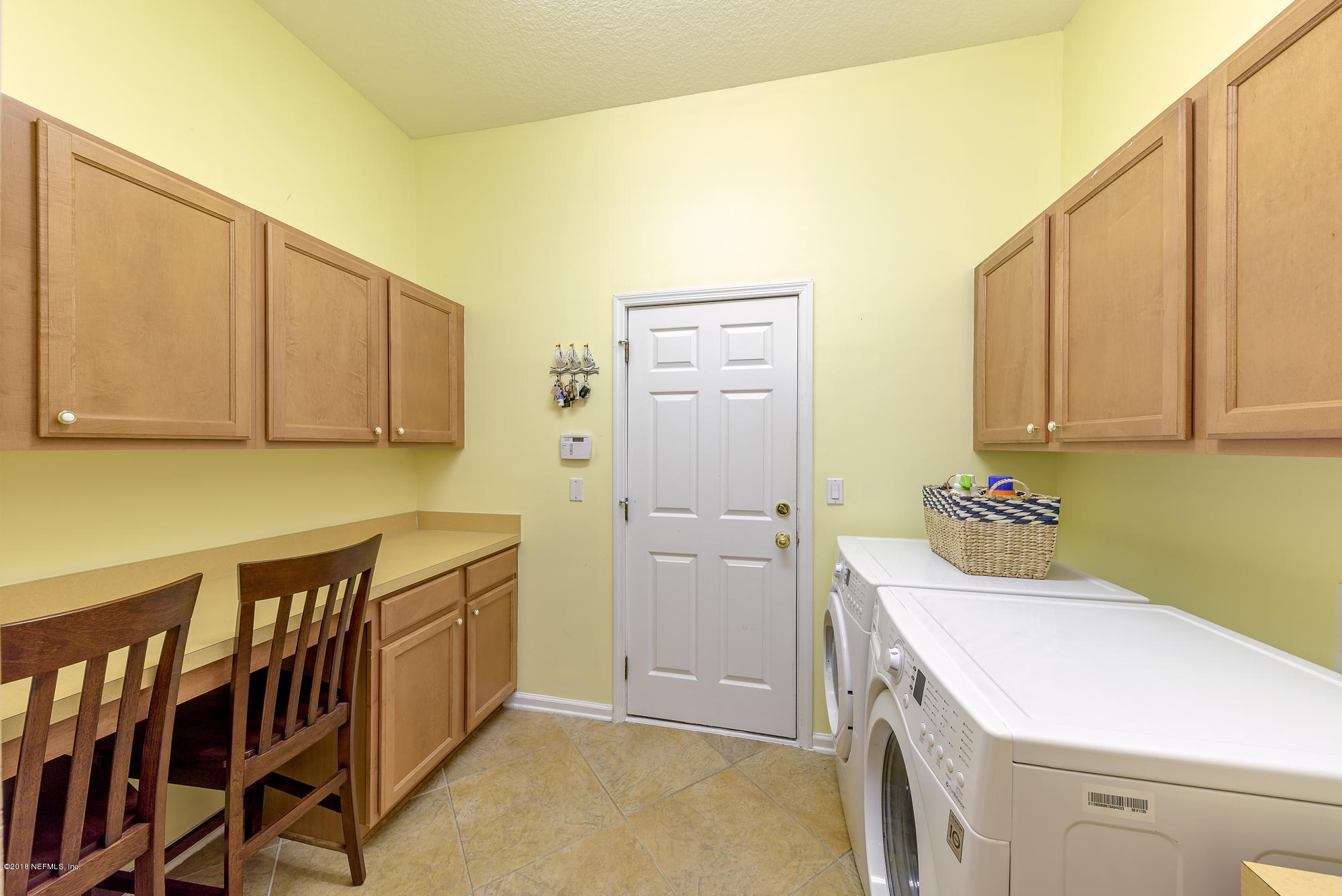6175 Wakulla Springs Road Jacksonville, FL 32258 - Photo 34 of 40 Laundry Room w. Counter & Cabinets!