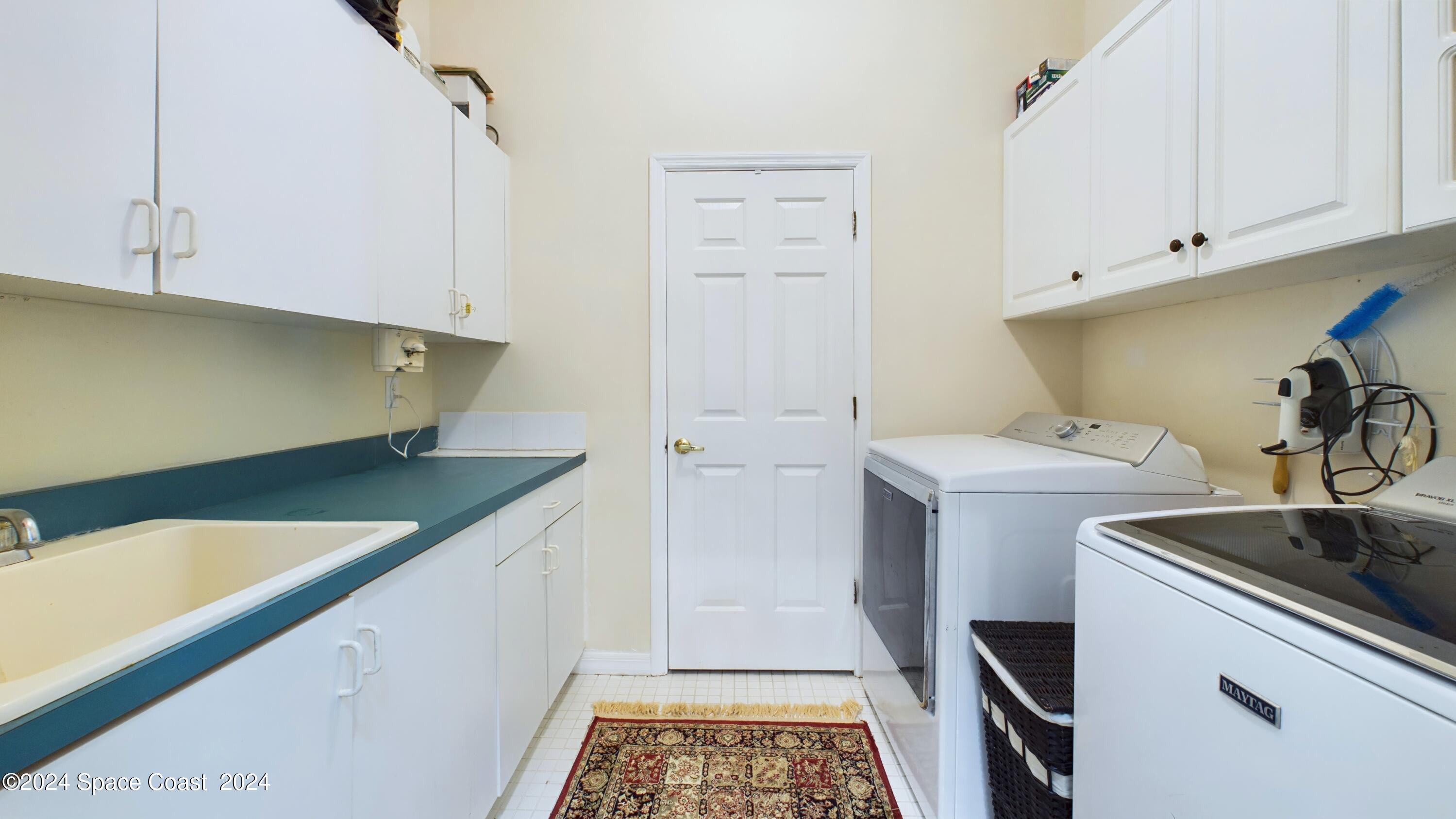 7746 Windover Way Titusville, FL 32780 - Photo 25 of 61 Laundry