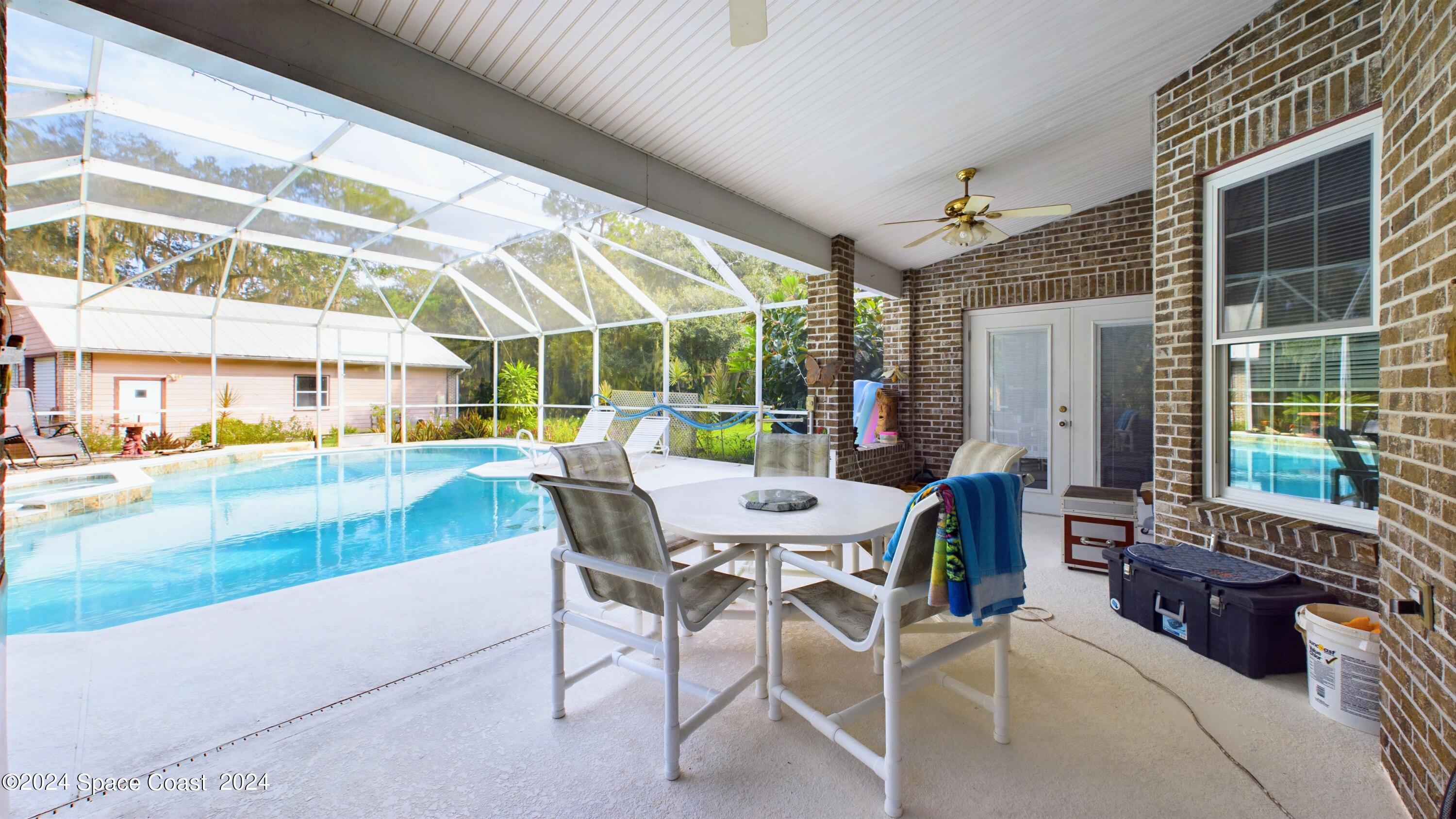 7746 Windover Way Titusville, FL 32780 - Photo 58 of 61 Pool/Back Porch