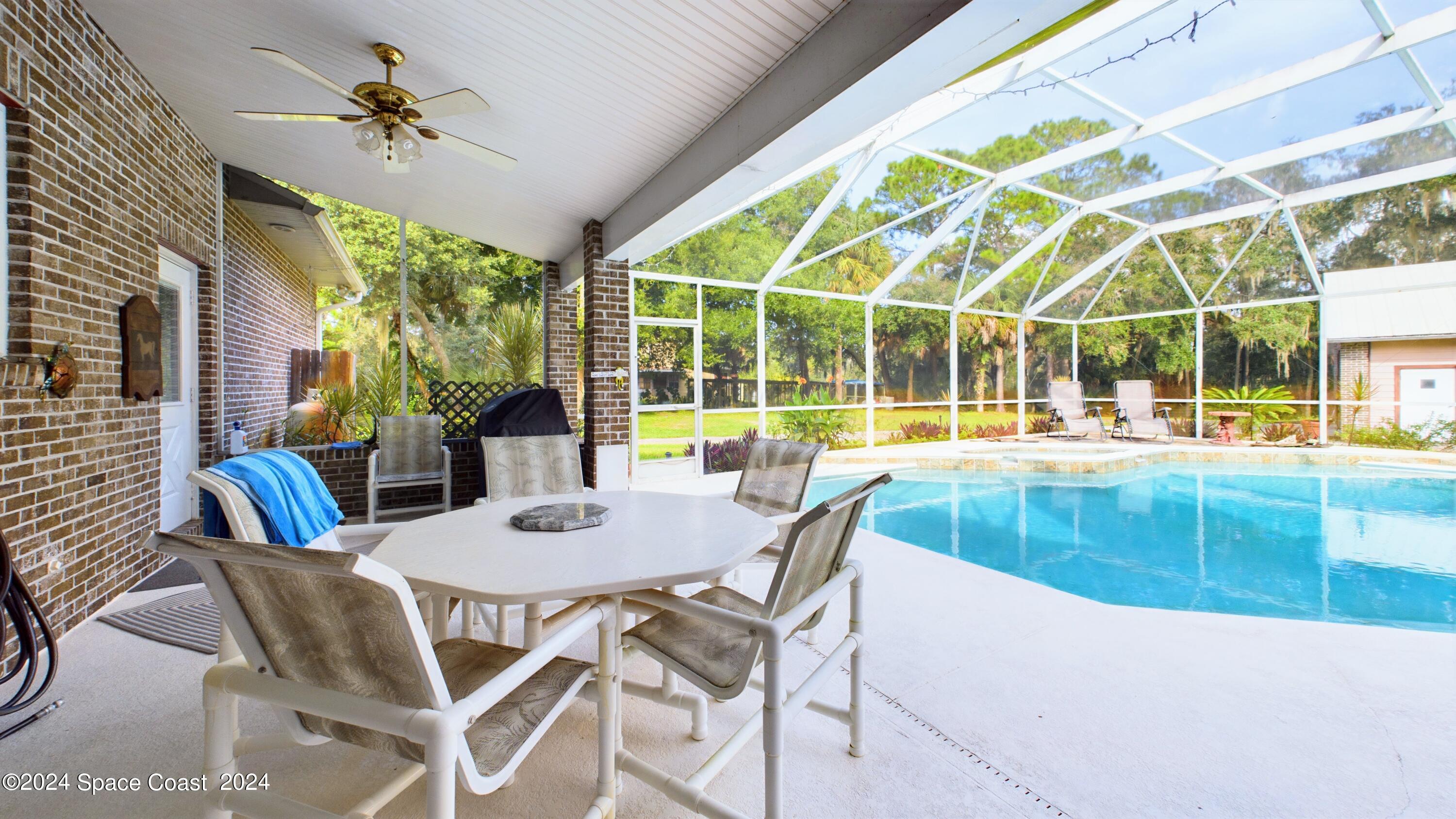 7746 Windover Way Titusville, FL 32780 - Photo 59 of 61 Pool/Back Porch
