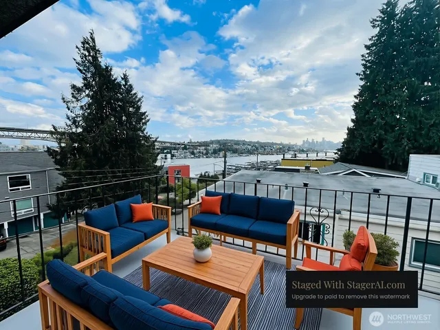 a kitchen with stainless steel appliances a sink a stove and a refrigerator
