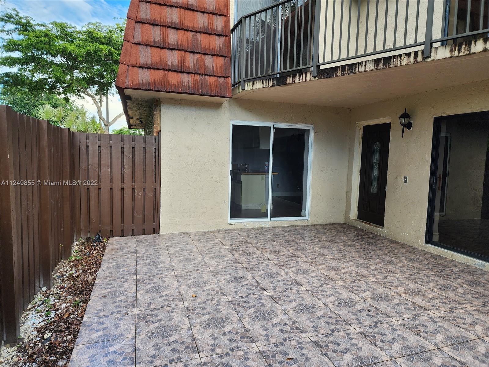 8139 Boca Rio Drive, Unit 8139 Boca Raton, FL 33433 - Photo 3 of 23 a view of a backyard of the house
