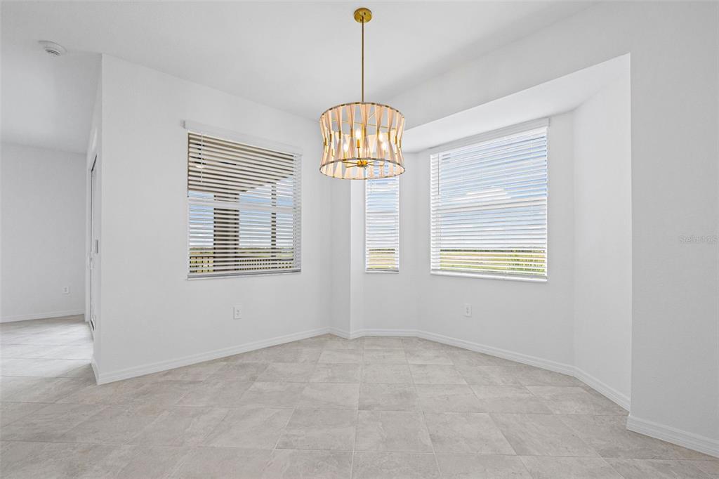 19140 Scallop Loop, Unit 401 Bradenton, FL 34211 - Photo 29 of 52 a view of empty room with windows