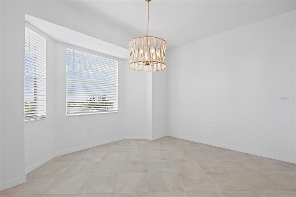 19140 Scallop Loop, Unit 401 Bradenton, FL 34211 - Photo 30 of 52 a view of an empty room with a window
