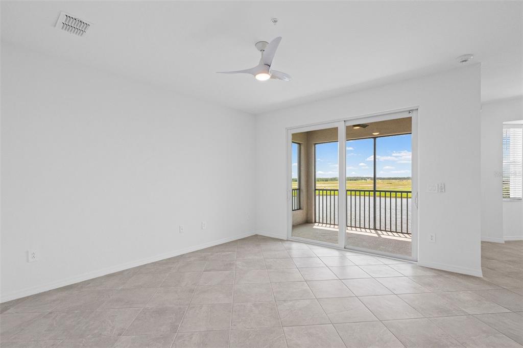 19140 Scallop Loop, Unit 401 Bradenton, FL 34211 - Photo 33 of 52 wooden floor in a room