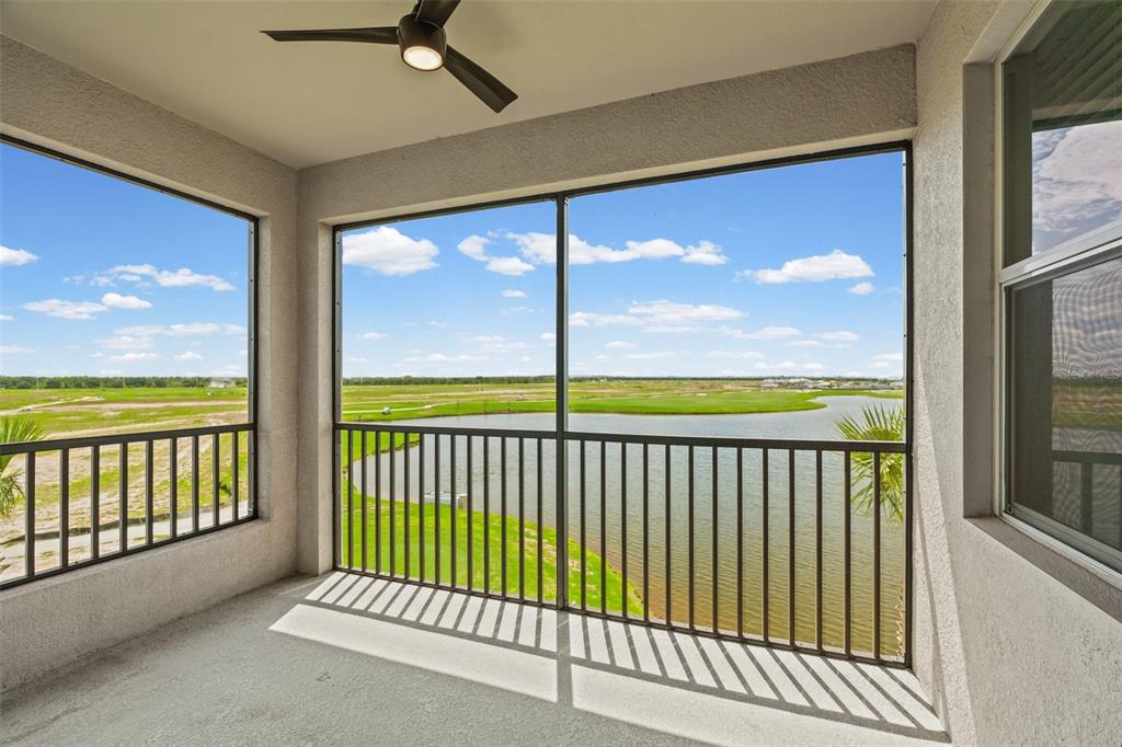 19140 Scallop Loop, Unit 401 Bradenton, FL 34211 - Photo 38 of 52 a view of a balcony with a floor to ceiling window
