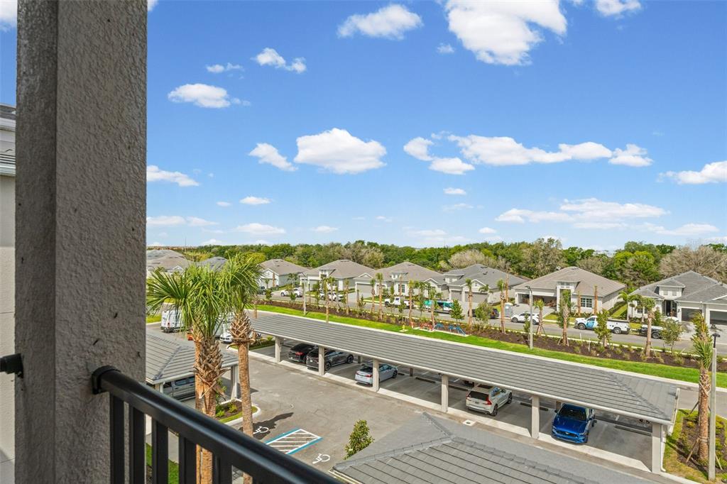 19140 Scallop Loop, Unit 401 Bradenton, FL 34211 - Photo 7 of 52 a view of a balcony with city view