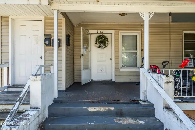 a view of a entryway door of the house