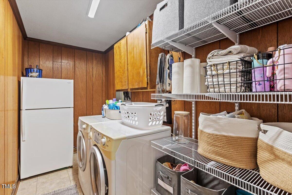4912 Elizabeth Drive Raleigh, NC 27604 - Photo 13 of 35 a utility room with dryer and washer