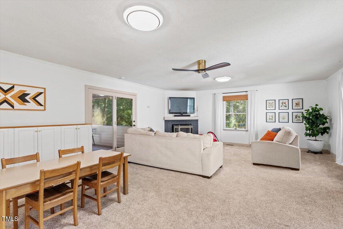 4912 Elizabeth Drive Raleigh, NC 27604 - Photo 15 of 35 a living room with furniture and a large window