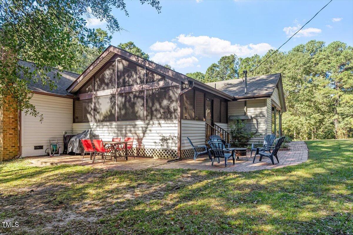 4912 Elizabeth Drive Raleigh, NC 27604 - Photo 23 of 35 a view of house with outdoor seating