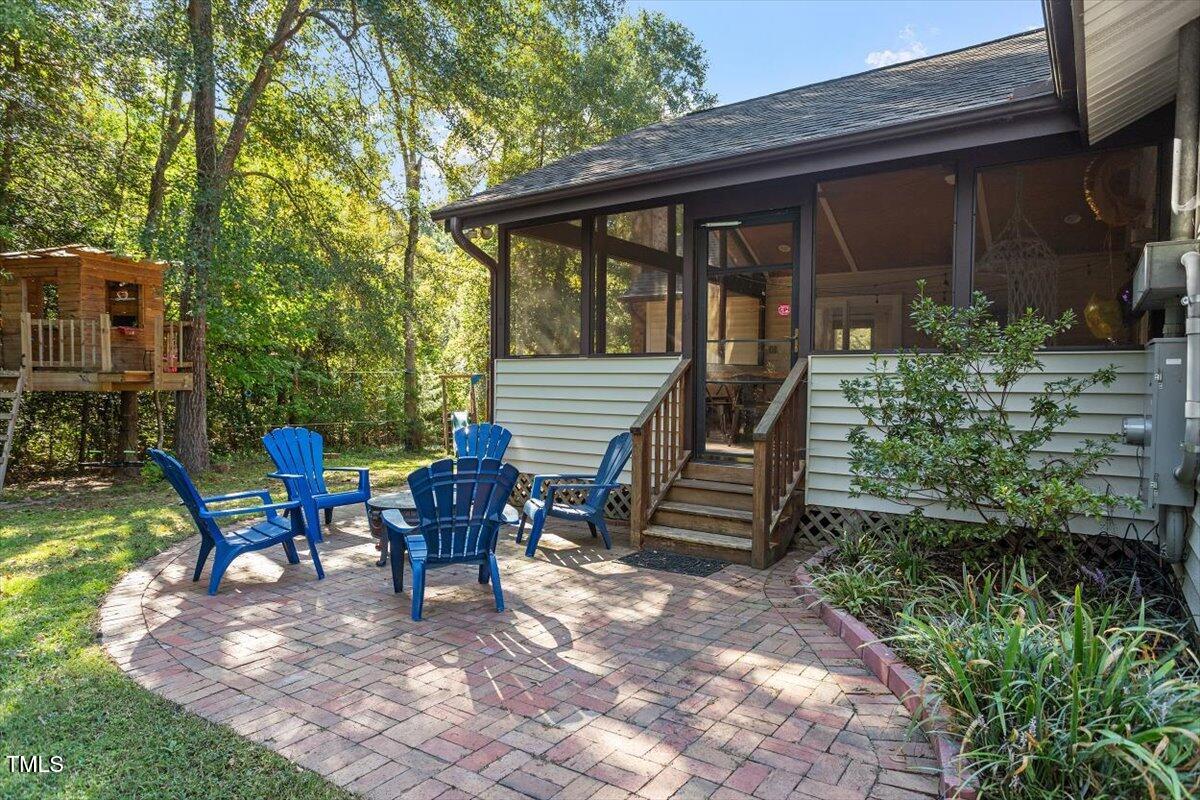 4912 Elizabeth Drive Raleigh, NC 27604 - Photo 28 of 35 a view of backyard with outdoor seating and plants