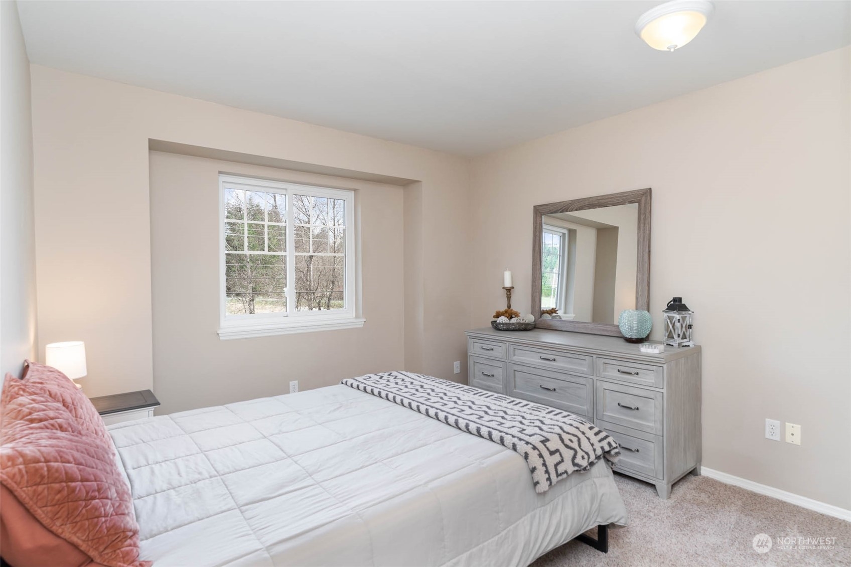 15503 Cedar Grove Road Southeast Issaquah, WA 98027 - Photo 17 of 27 a bedroom with a bed and a dresser