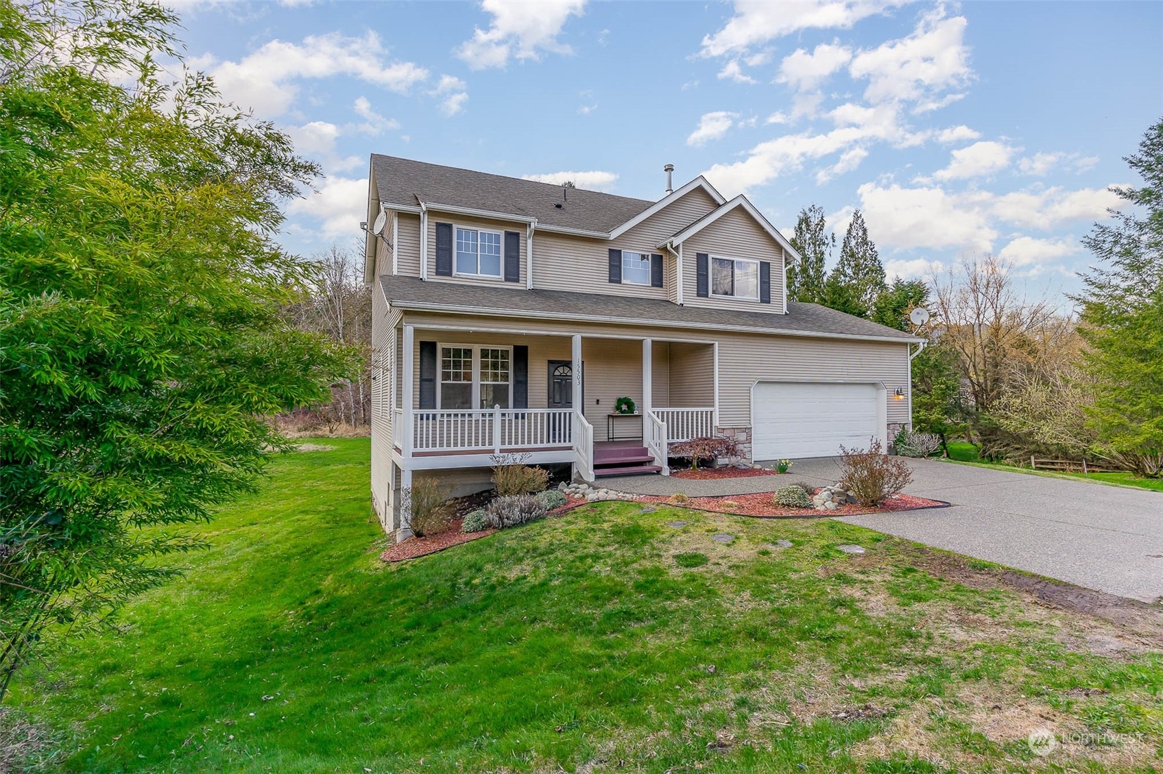 15503 Cedar Grove Road Southeast Issaquah, WA 98027 - Photo 2 of 27 a house view with a garden space