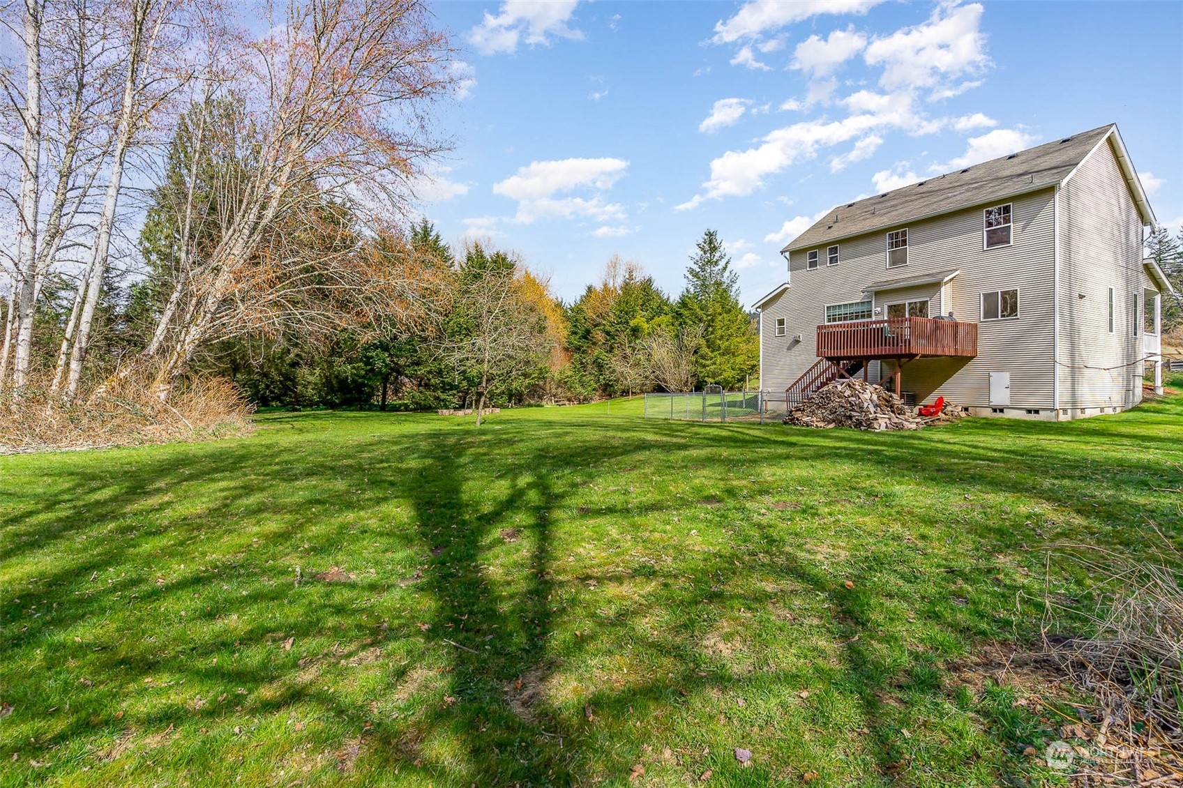 15503 Cedar Grove Road Southeast Issaquah, WA 98027 - Photo 27 of 27 a view of a house with a big yard and large trees