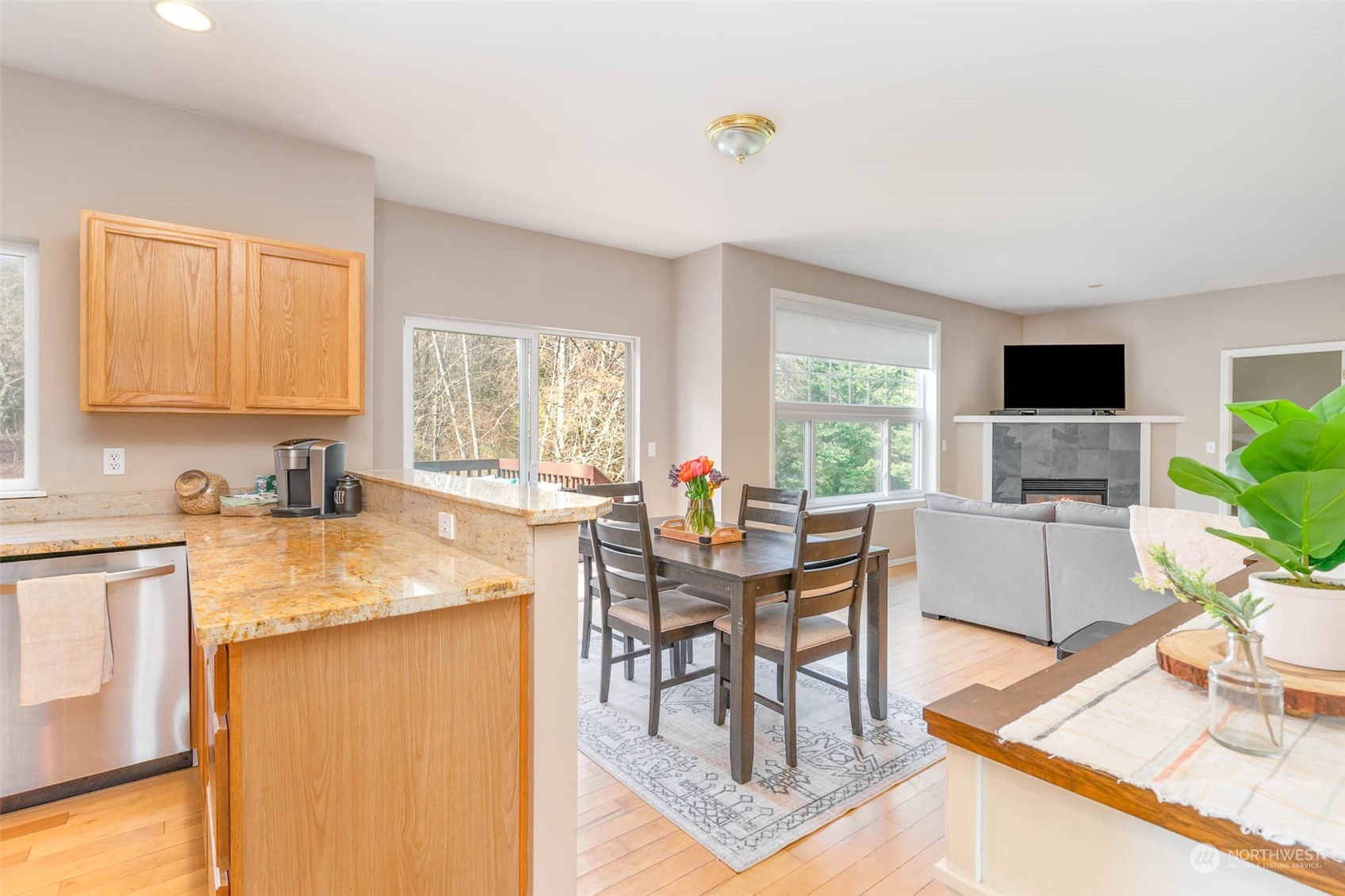 15503 Cedar Grove Road Southeast Issaquah, WA 98027 - Photo 10 of 27 a view of a dining room with furniture and a window