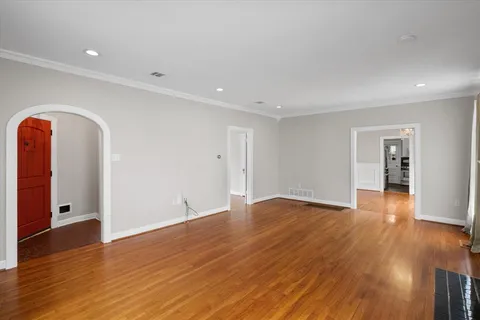 a view of livingroom with window and wooden floor