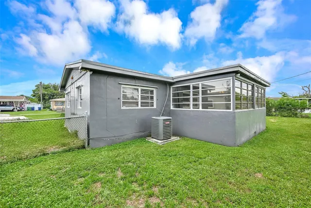 a house view with a garden space