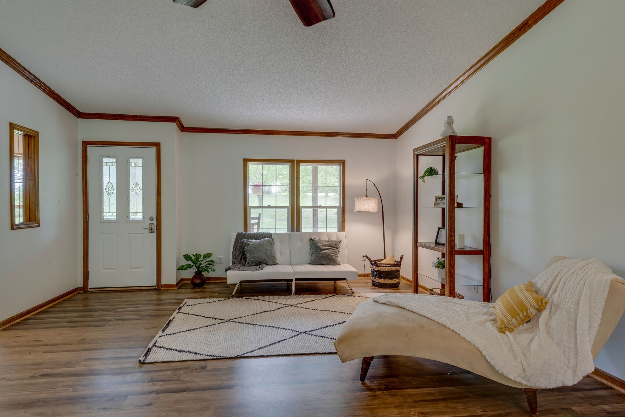 7289 Anderson Road Fairview, TN 37062 - Photo 14 of 51 a spacious bedroom with a bed a window and potted plant on table
