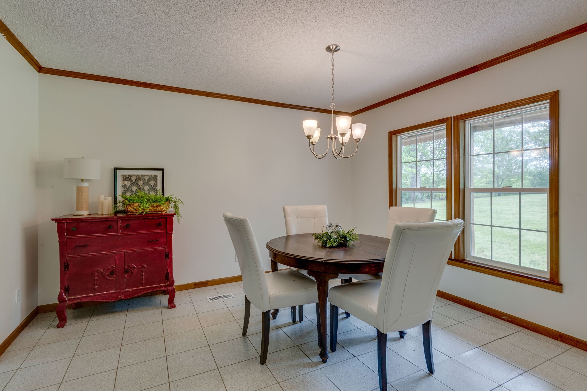 7289 Anderson Road Fairview, TN 37062 - Photo 19 of 51 a view of a dining room with furniture and chandelier
