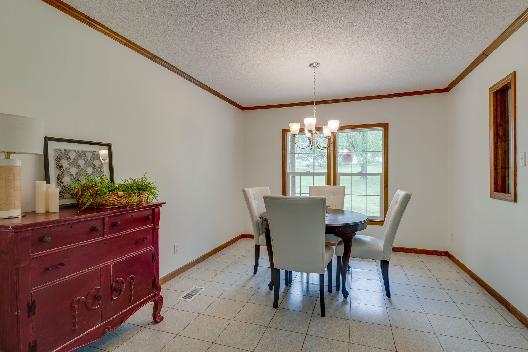 7289 Anderson Road Fairview, TN 37062 - Photo 20 of 51 a view of a dining room with furniture and chandelier