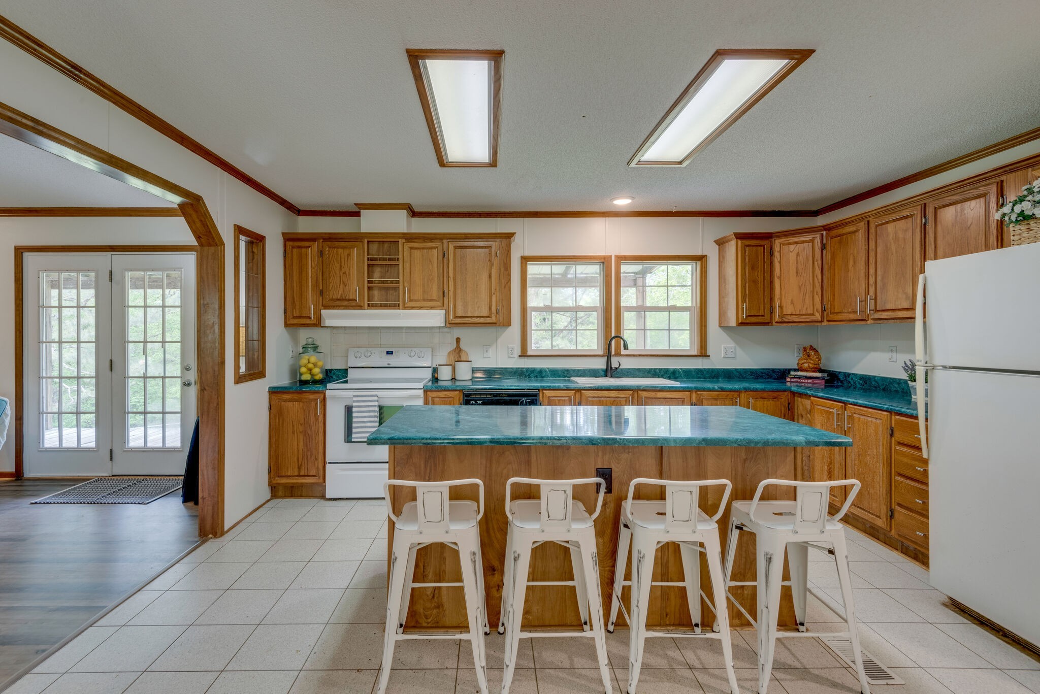 7289 Anderson Road Fairview, TN 37062 - Photo 23 of 51 a kitchen with stainless steel appliances granite countertop a stove a sink and a refrigerator