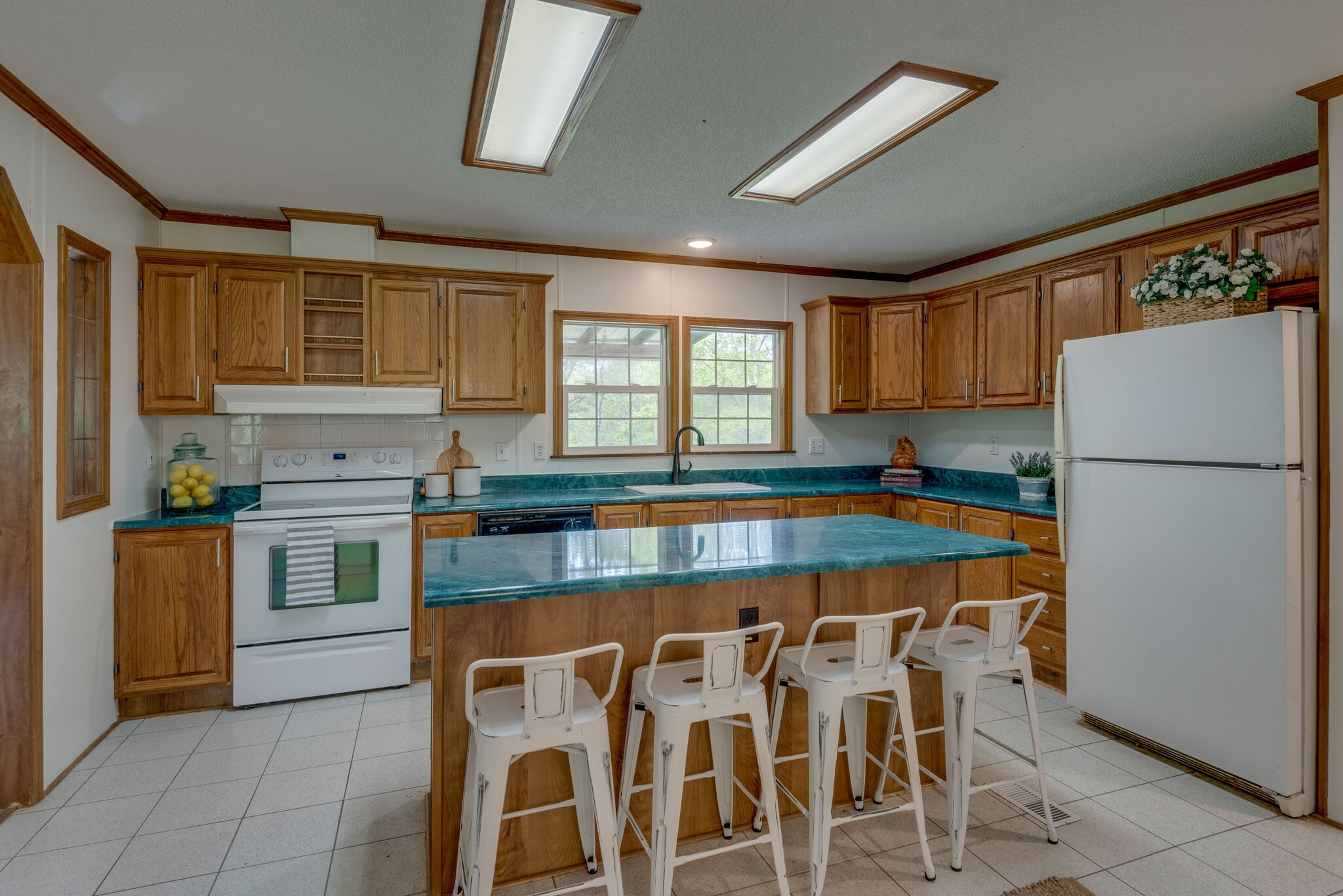 7289 Anderson Road Fairview, TN 37062 - Photo 24 of 51 a kitchen with stainless steel appliances granite countertop a stove and a refrigerator