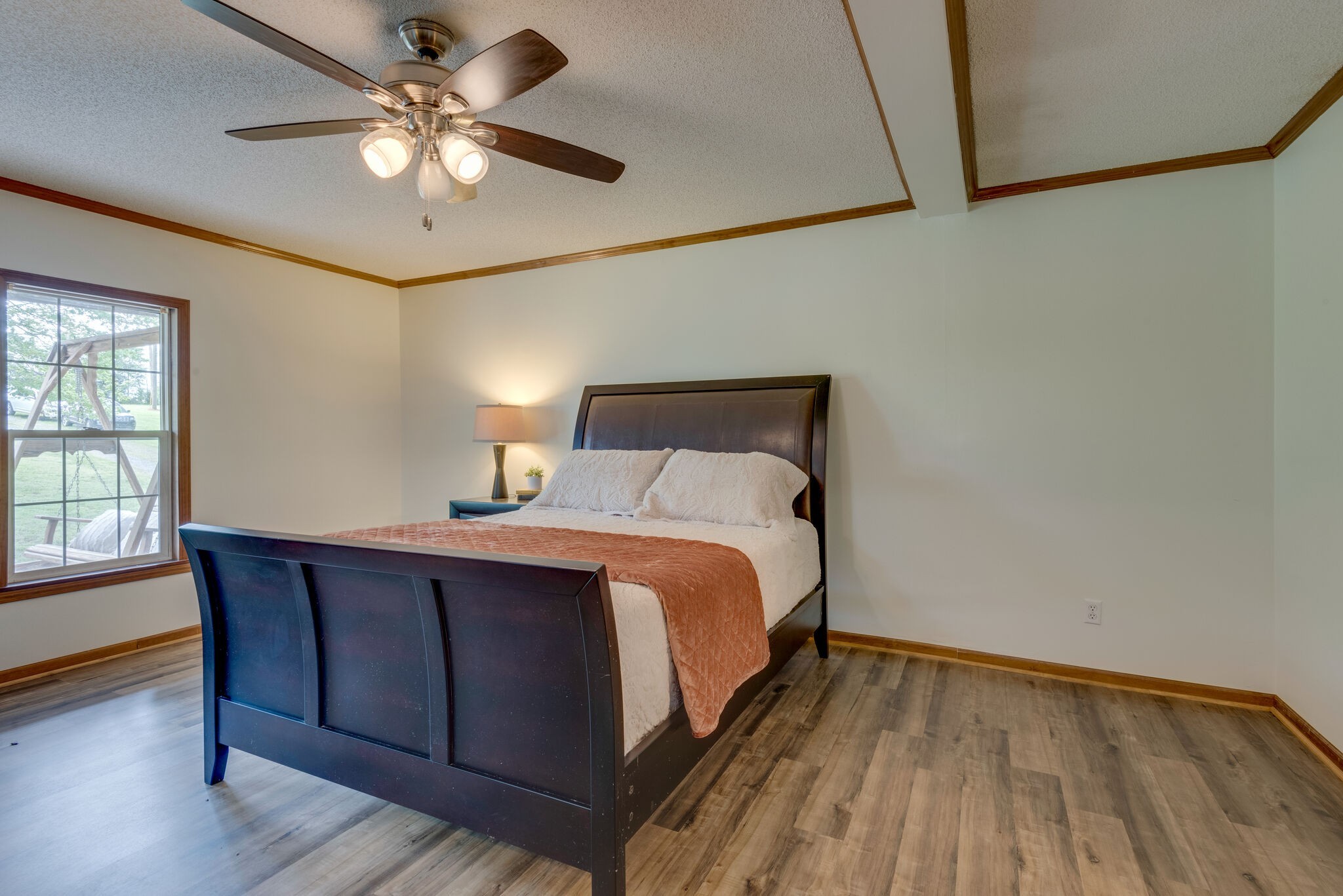 7289 Anderson Road Fairview, TN 37062 - Photo 27 of 51 a bedroom with a bed and a chandelier
