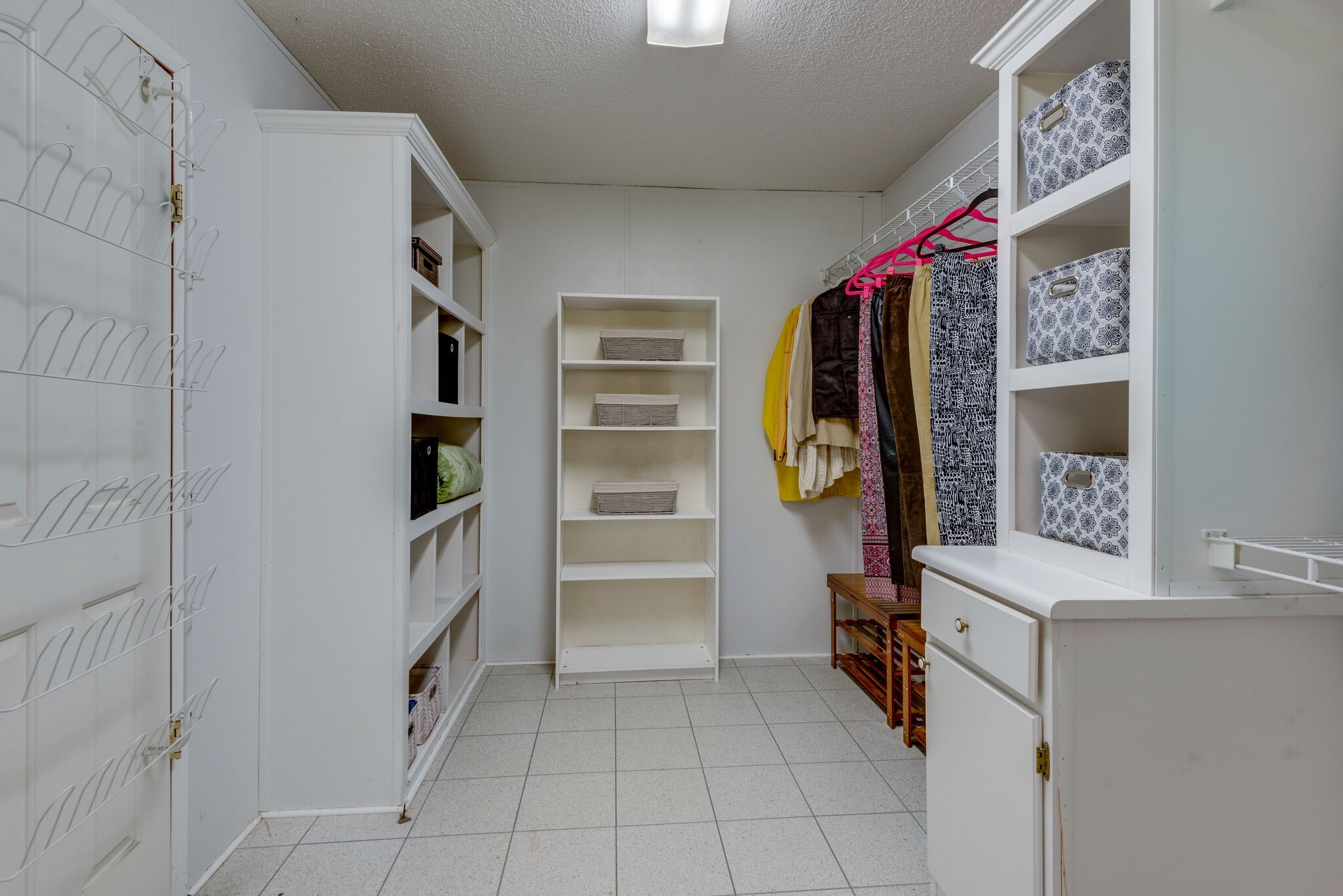 7289 Anderson Road Fairview, TN 37062 - Photo 31 of 51 a view of walk in closet with clothes and shoes