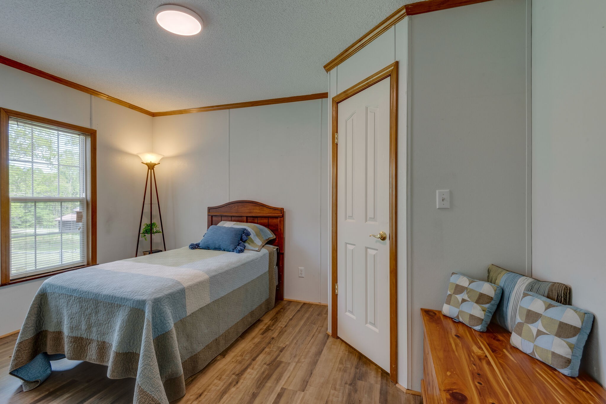 7289 Anderson Road Fairview, TN 37062 - Photo 32 of 51 a bedroom with a bed and wooden floor