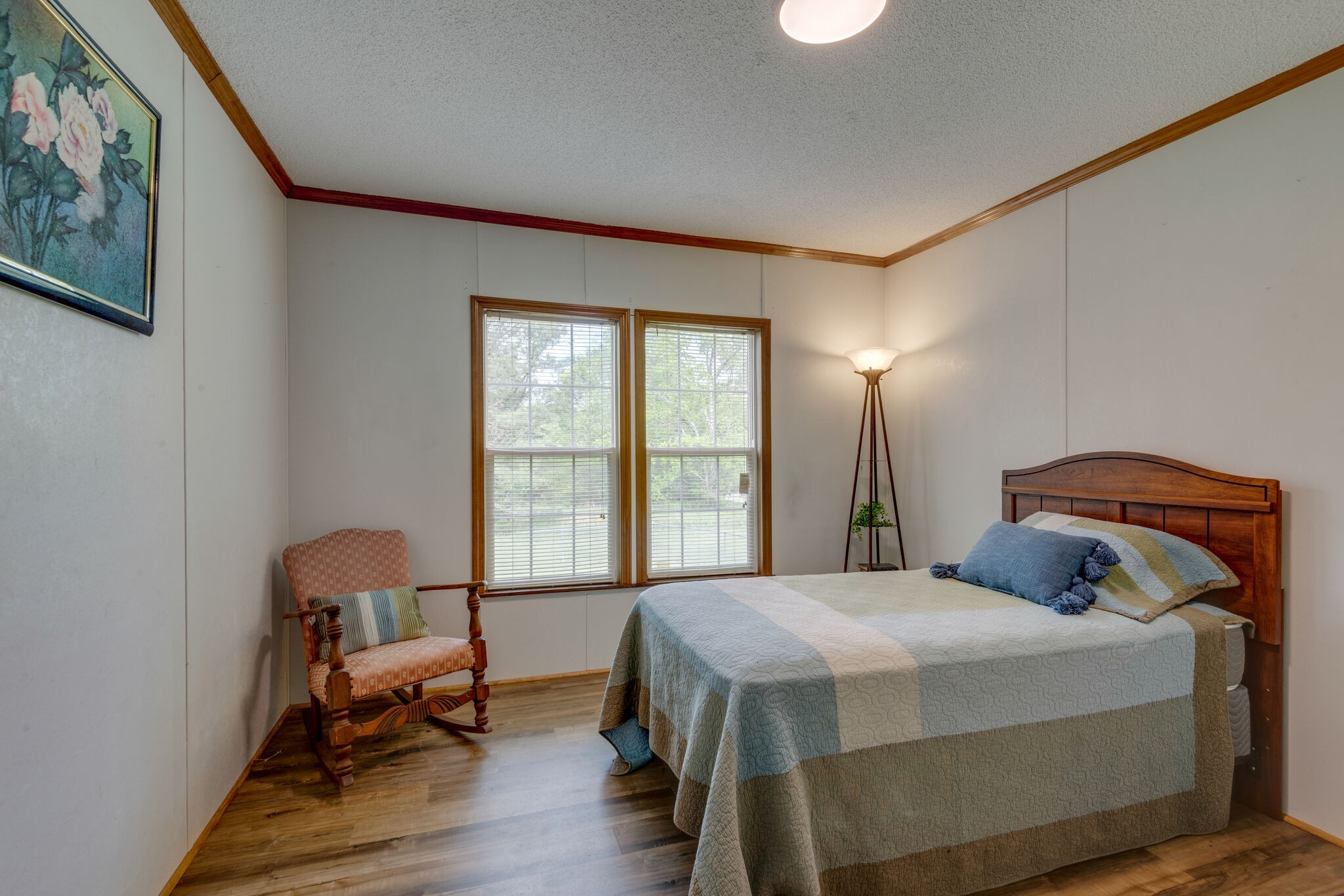 7289 Anderson Road Fairview, TN 37062 - Photo 33 of 51 a bedroom with a bed and wooden floor