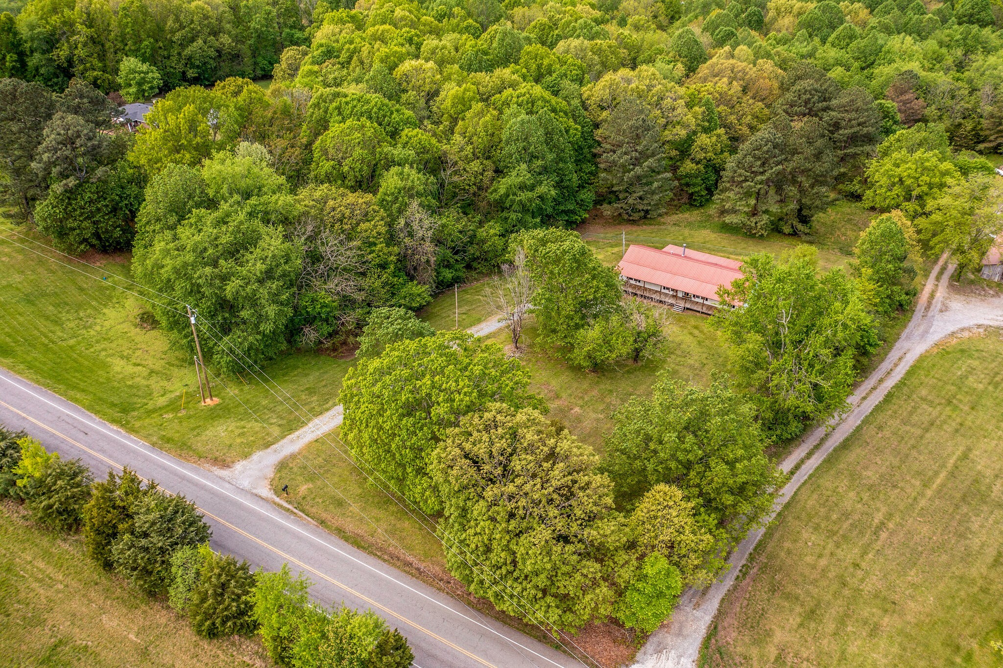 7289 Anderson Road Fairview, TN 37062 - Photo 4 of 51 a view of a garden with an outdoor seating
