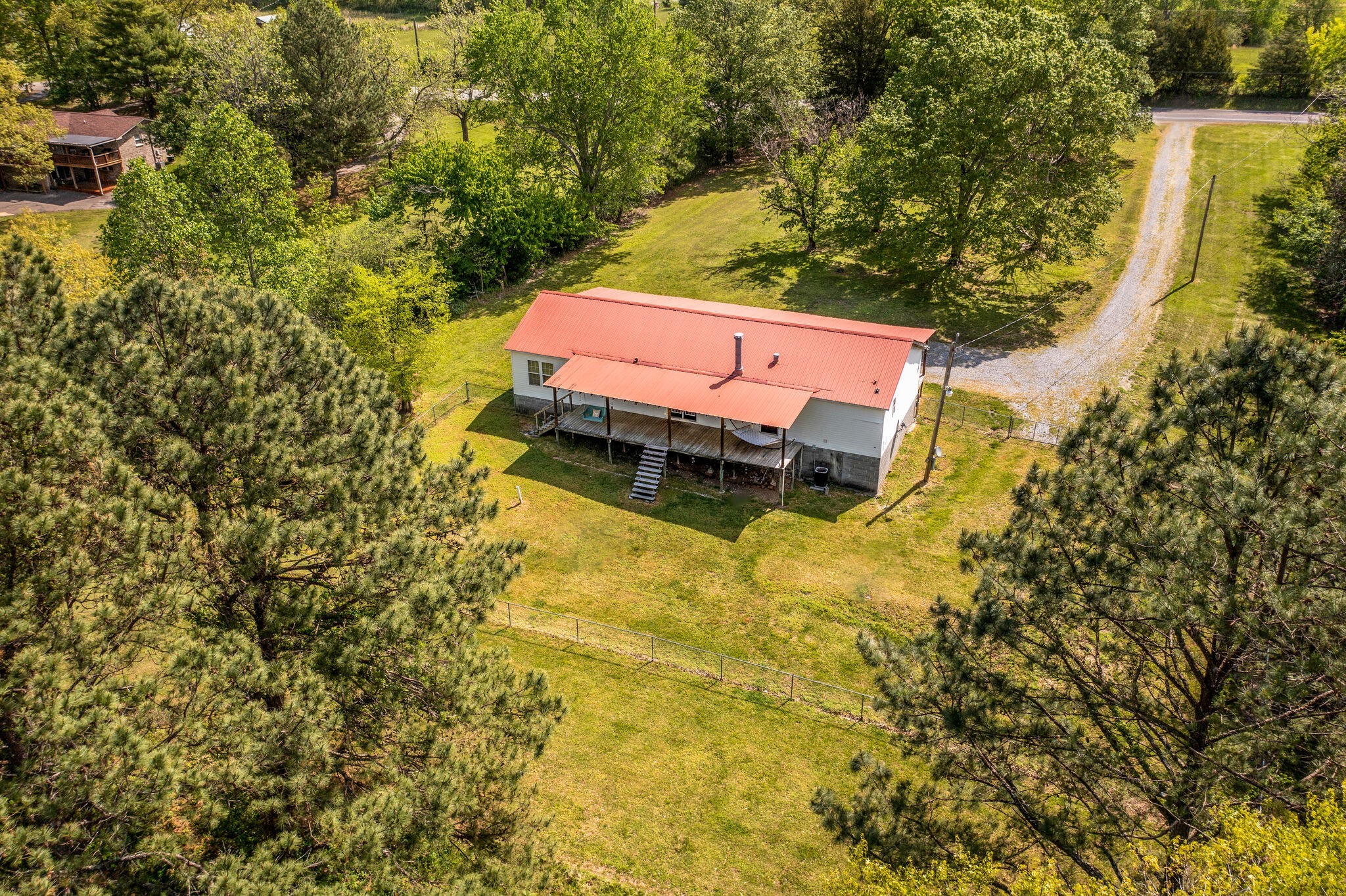 7289 Anderson Road Fairview, TN 37062 - Photo 45 of 51 a blue swimming pool with some trees