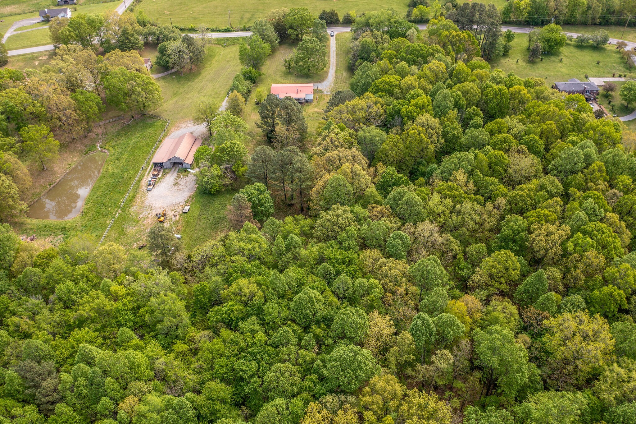 7289 Anderson Road Fairview, TN 37062 - Photo 48 of 51 an aerial view of residential houses with outdoor space and trees
