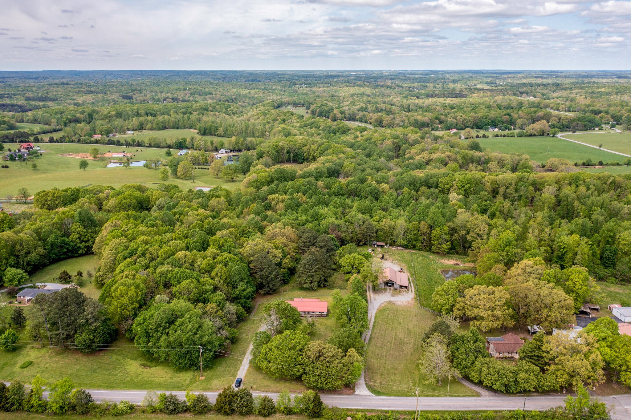 7289 Anderson Road Fairview, TN 37062 - Photo 51 of 51 an aerial view of residential houses with outdoor space and trees
